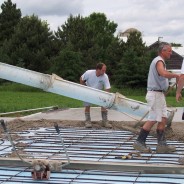 Photo of construction workers pouring the concrete for the new Schoenstatt wayside Shrine.