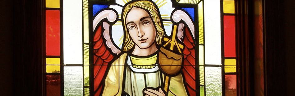 An up-close image of a stained glass window in our shrine.